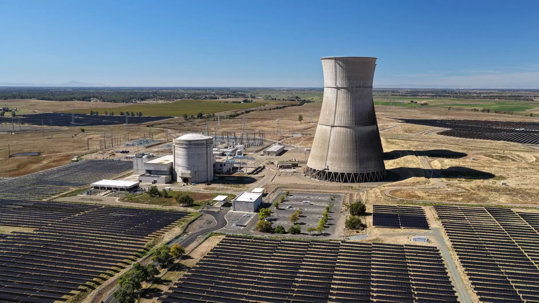 Capacity Markets: A Guide for Asia — aerial view of thermal power plant with transmission lines