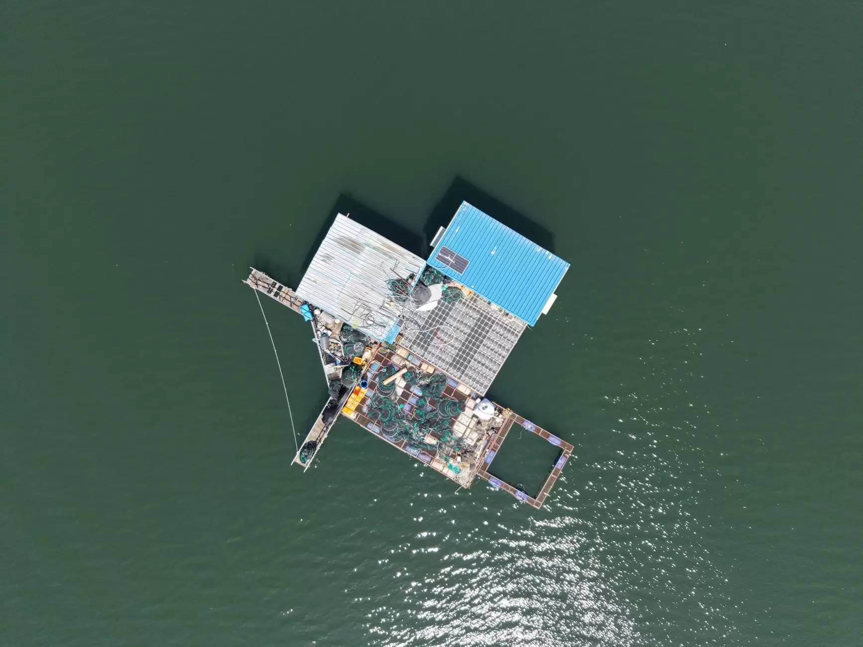 How Renewable Energy Certificates Work and What They Actually Represent — floating solar panels on reservoir