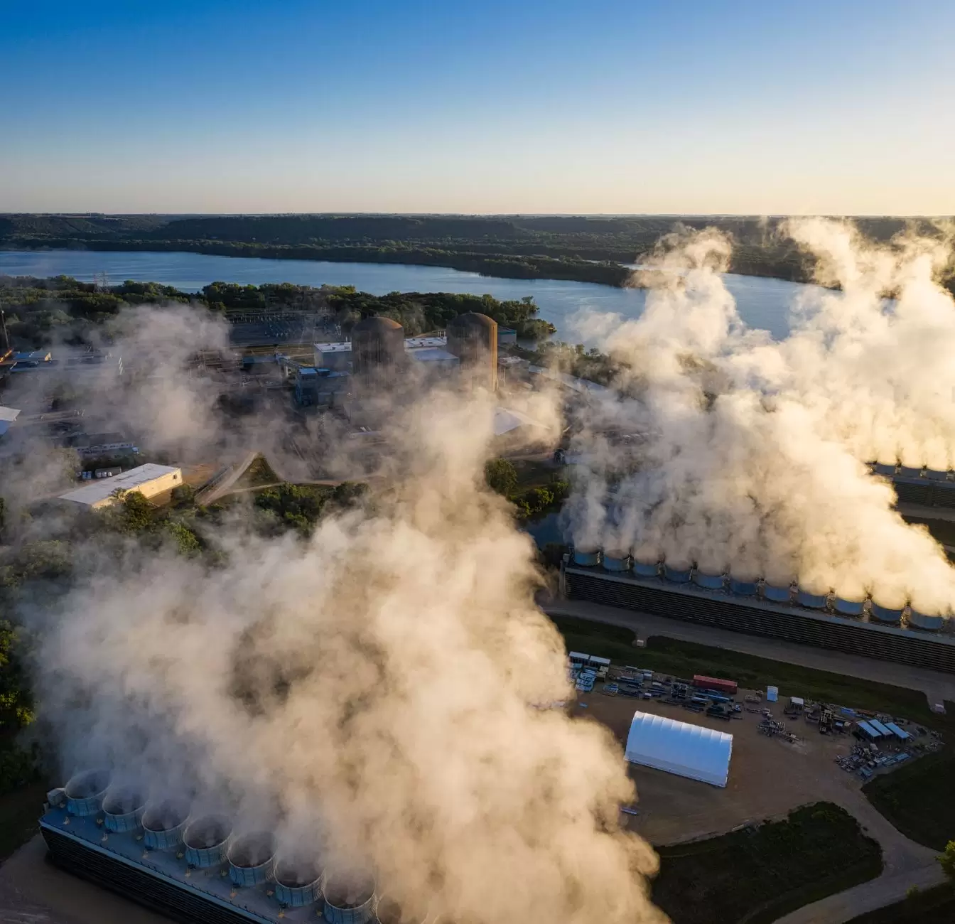 Scope 1 vs Scope 2 Emissions: What They Mean and Why They Matter for the Power Sector — coal power plant cooling towers releasing steam