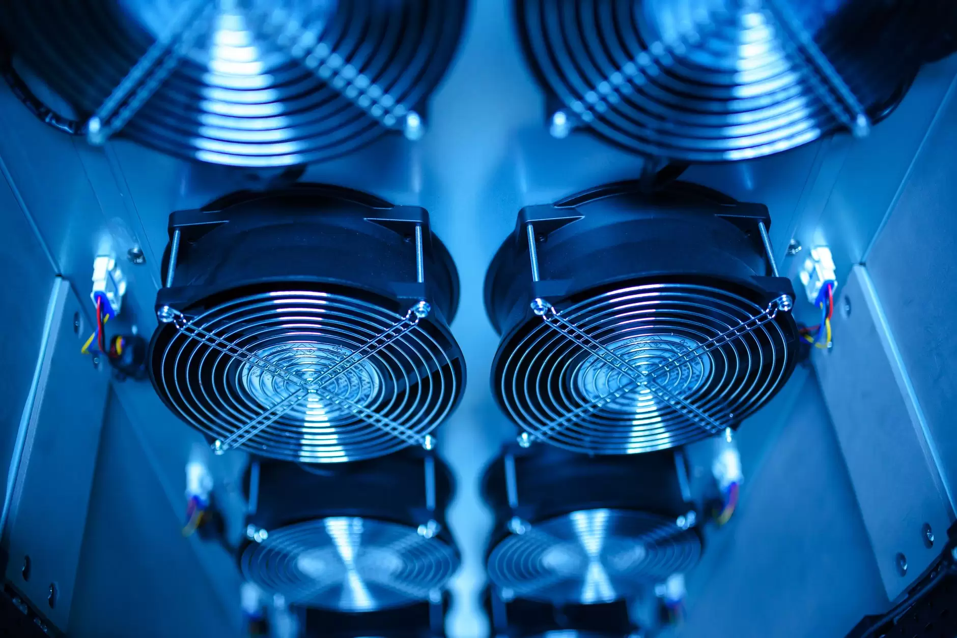 Why Data Center Electricity Demand Is Surging and What It Means for Power Systems — large modern data center campus with industrial cooling equipment and power infrastructure